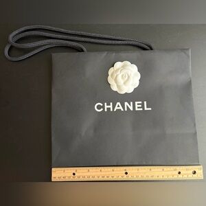 CHANEL Black Bag with White Camellia